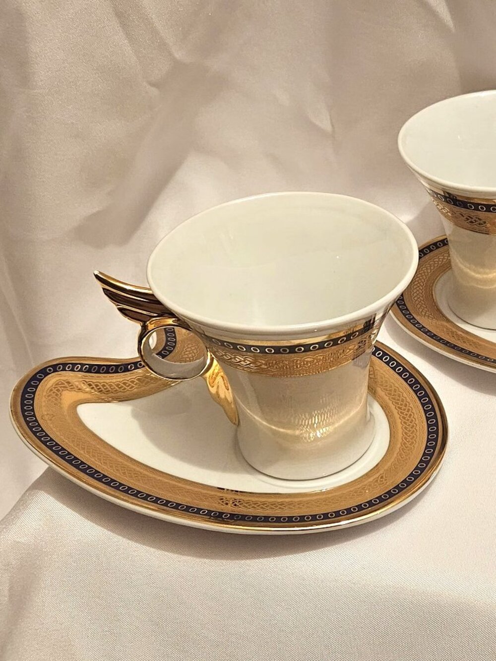 IMPERIAL FINE CHINA 4 PIECE CUP AND SAUCER SET